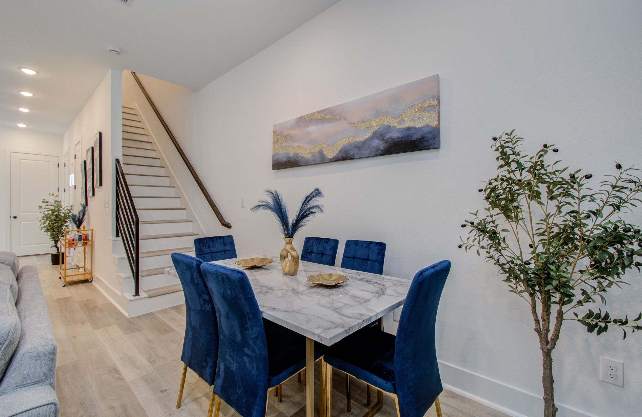 1616 Benson Street Houston, TX 77020 - Photo 16 of 38 a view of a dining room with furniture and wooden floor