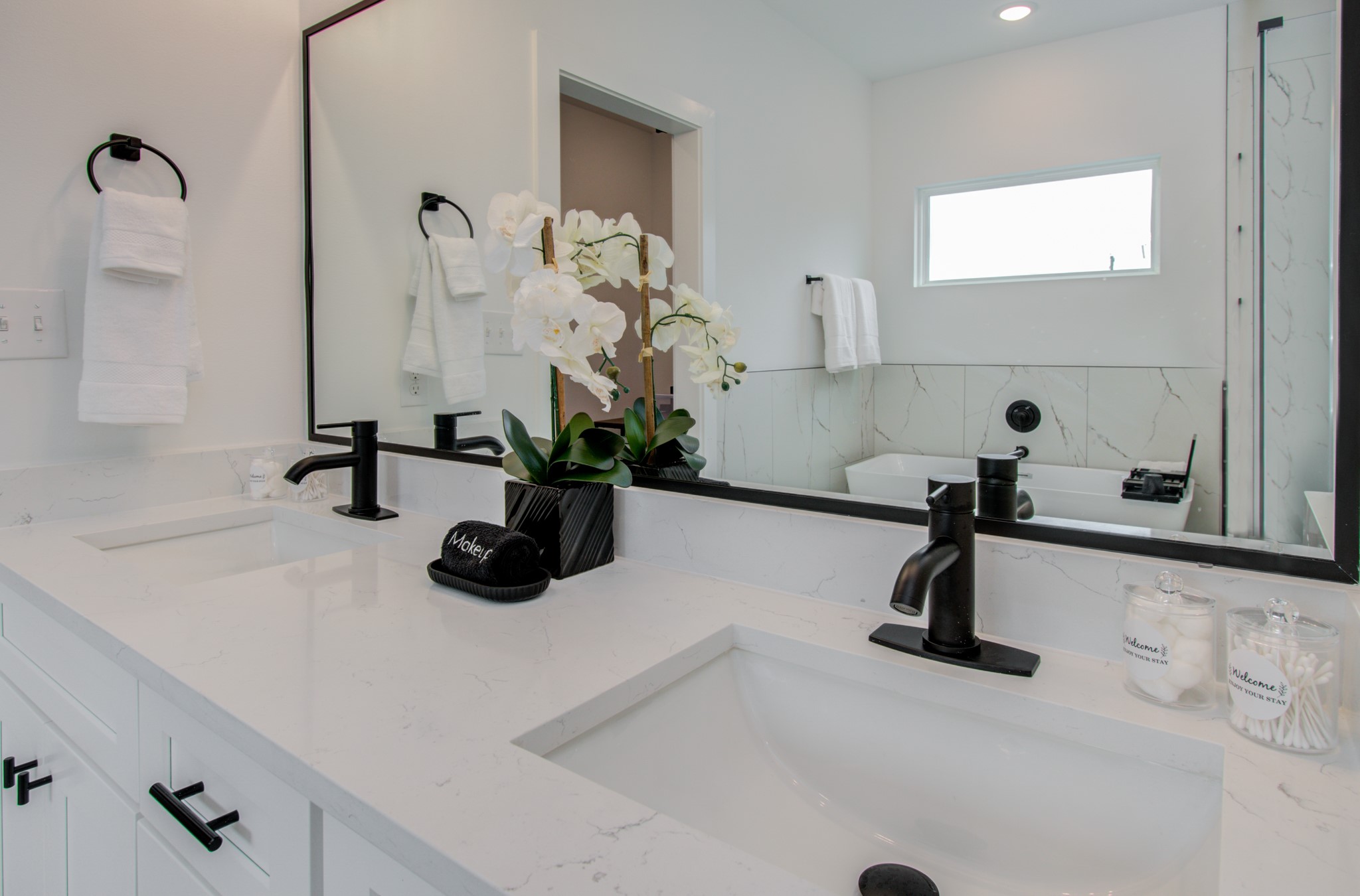 1616 Benson Street Houston, TX 77020 - Photo 25 of 38 a bathroom with a sink a toilet and a mirror