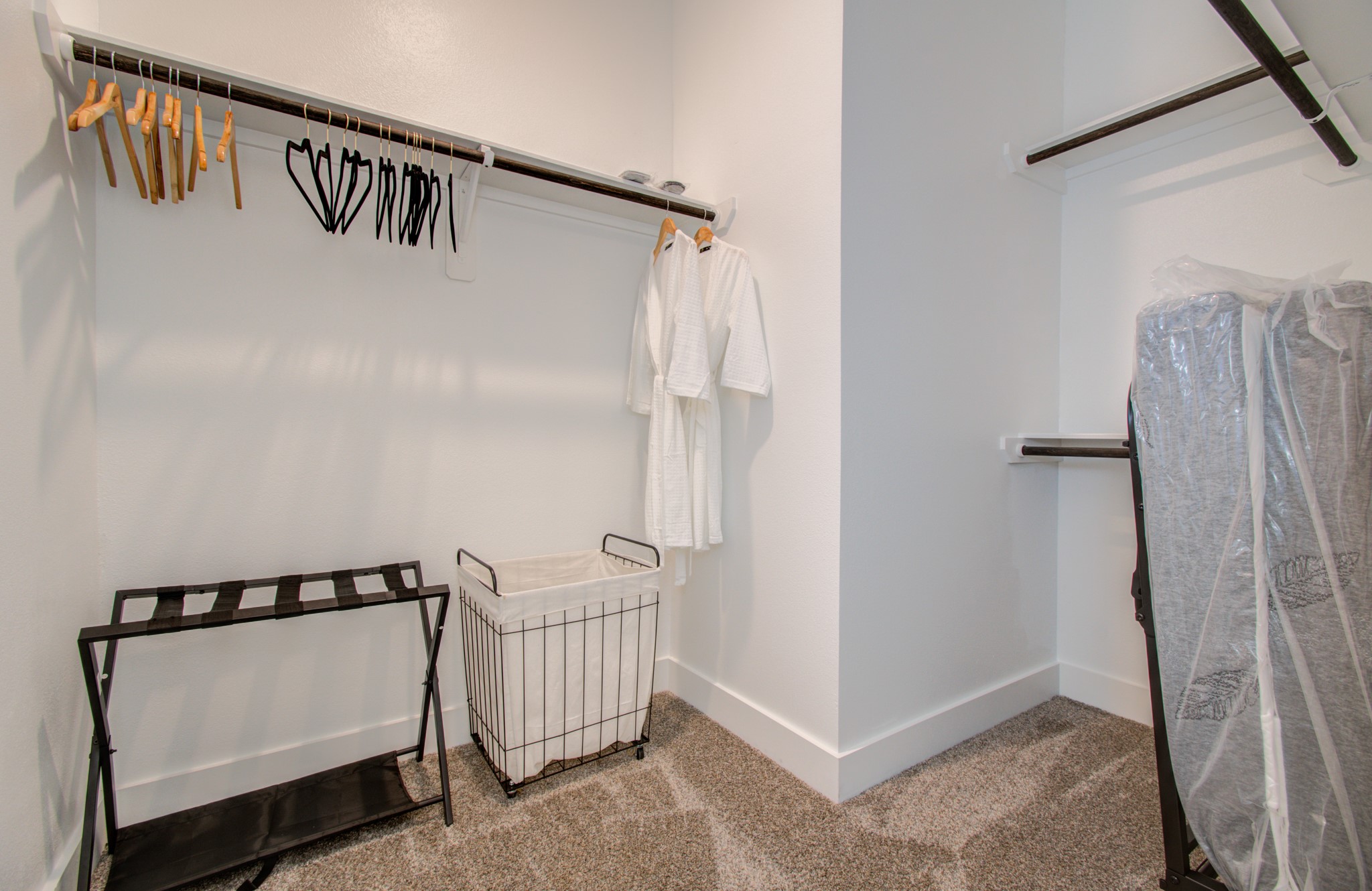1616 Benson Street Houston, TX 77020 - Photo 26 of 38 a view of a hallway with staircase with white walls