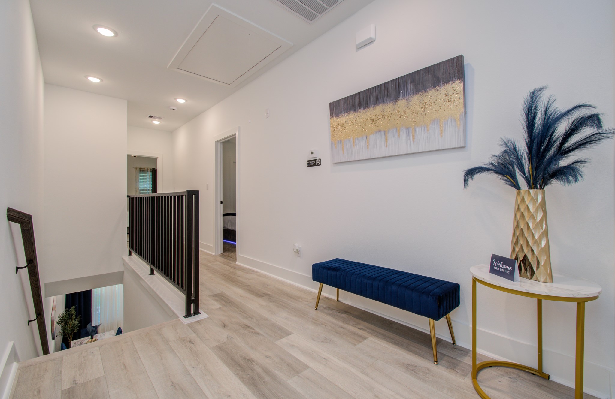 1616 Benson Street Houston, TX 77020 - Photo 27 of 38 a living room with furniture and a flat screen tv