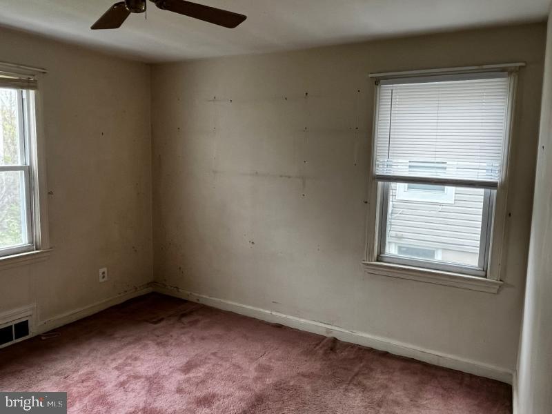 912 Nichols Drive Laurel, MD 20707 - Photo 11 of 14 an empty room with windows