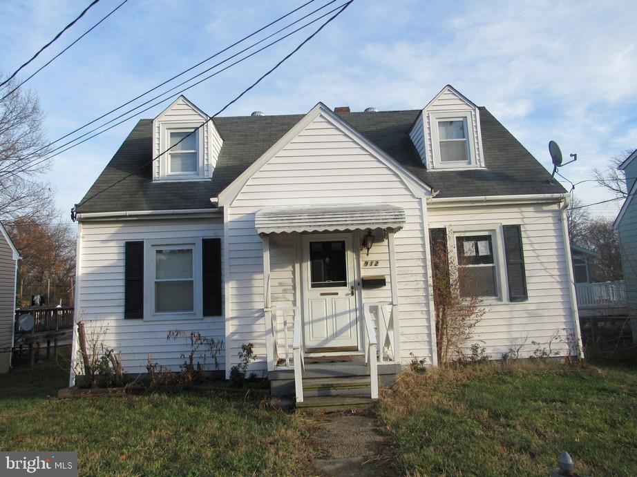 912 Nichols Drive Laurel, MD 20707 - Photo 2 of 14 a front view of a house with a yard