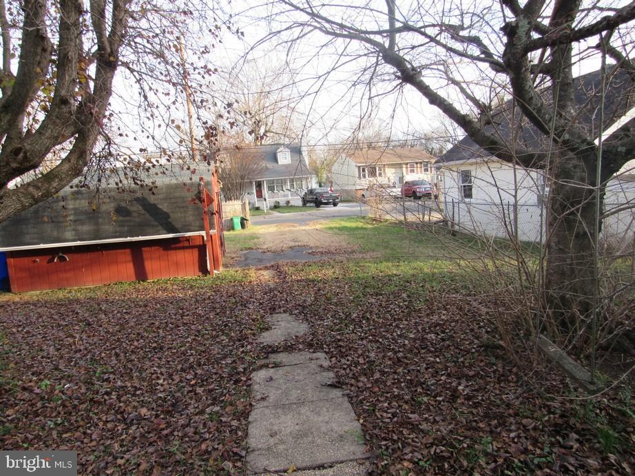 912 Nichols Drive Laurel, MD 20707 - Photo 5 of 14 a view of a yard with large trees