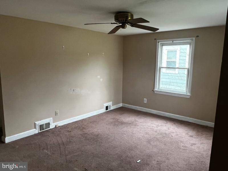 912 Nichols Drive Laurel, MD 20707 - Photo 9 of 14 a view of an empty room with a window