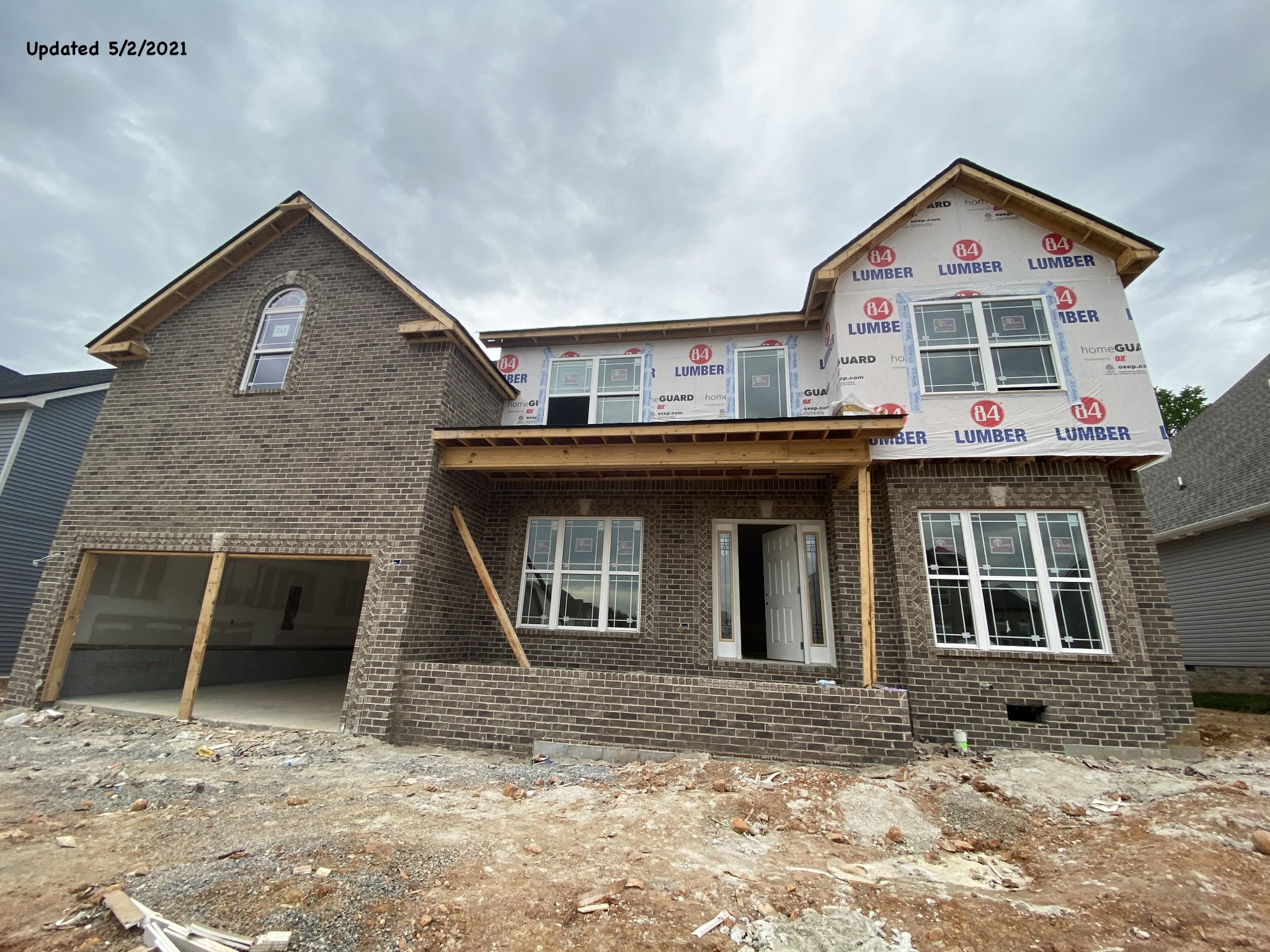 872 Burley Barn Road Clarksville, TN 37042 - Photo 1 of 4 a front view of a house with a yard and garage