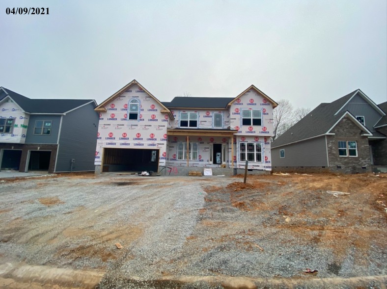 872 Burley Barn Road Clarksville, TN 37042 - Photo 2 of 4 a view of house with backyard and seating space