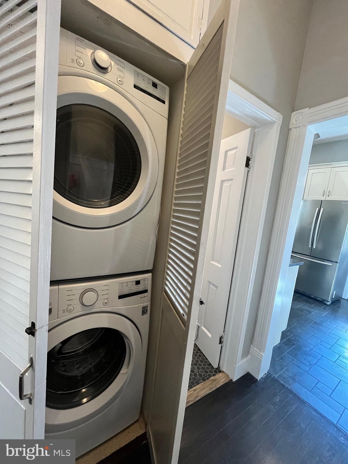 547 4th Street Southeast Washington, DC 20003 - Photo 7 of 13 a view of a hallway with washer and dryer