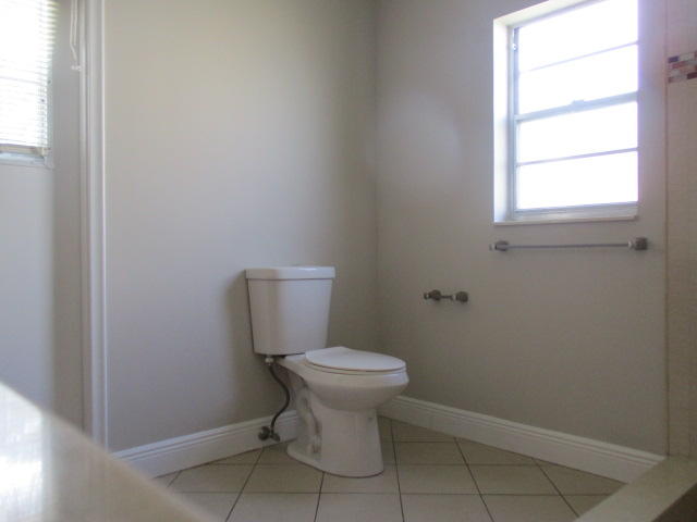 8904 Southwest 16th Street Boca Raton, FL 33433 - Photo 19 of 29 a bathroom with a toilet