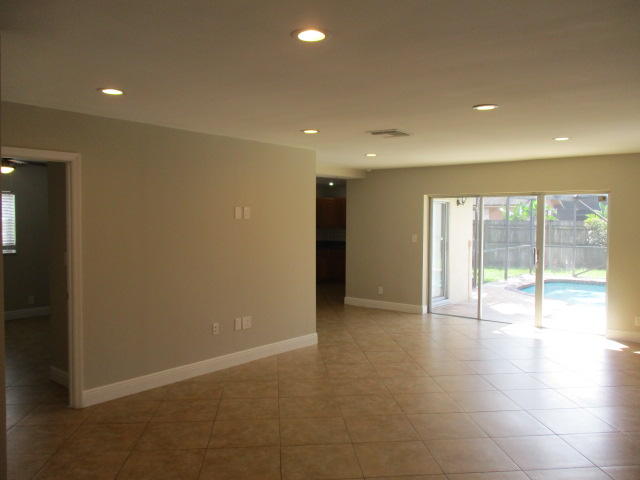 8904 Southwest 16th Street Boca Raton, FL 33433 - Photo 2 of 29 a view of an empty room with glass door