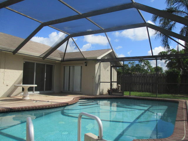 8904 Southwest 16th Street Boca Raton, FL 33433 - Photo 27 of 29 a house view with a backyard space