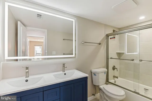 a bathroom with a shower and a bathtub