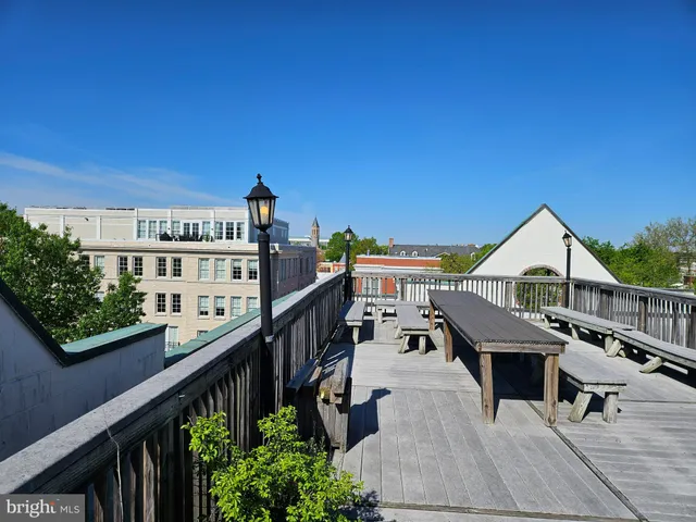 a view of a balcony with chairs