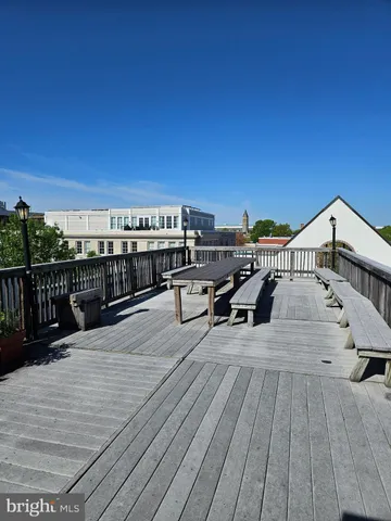 a view of a balcony with chairs