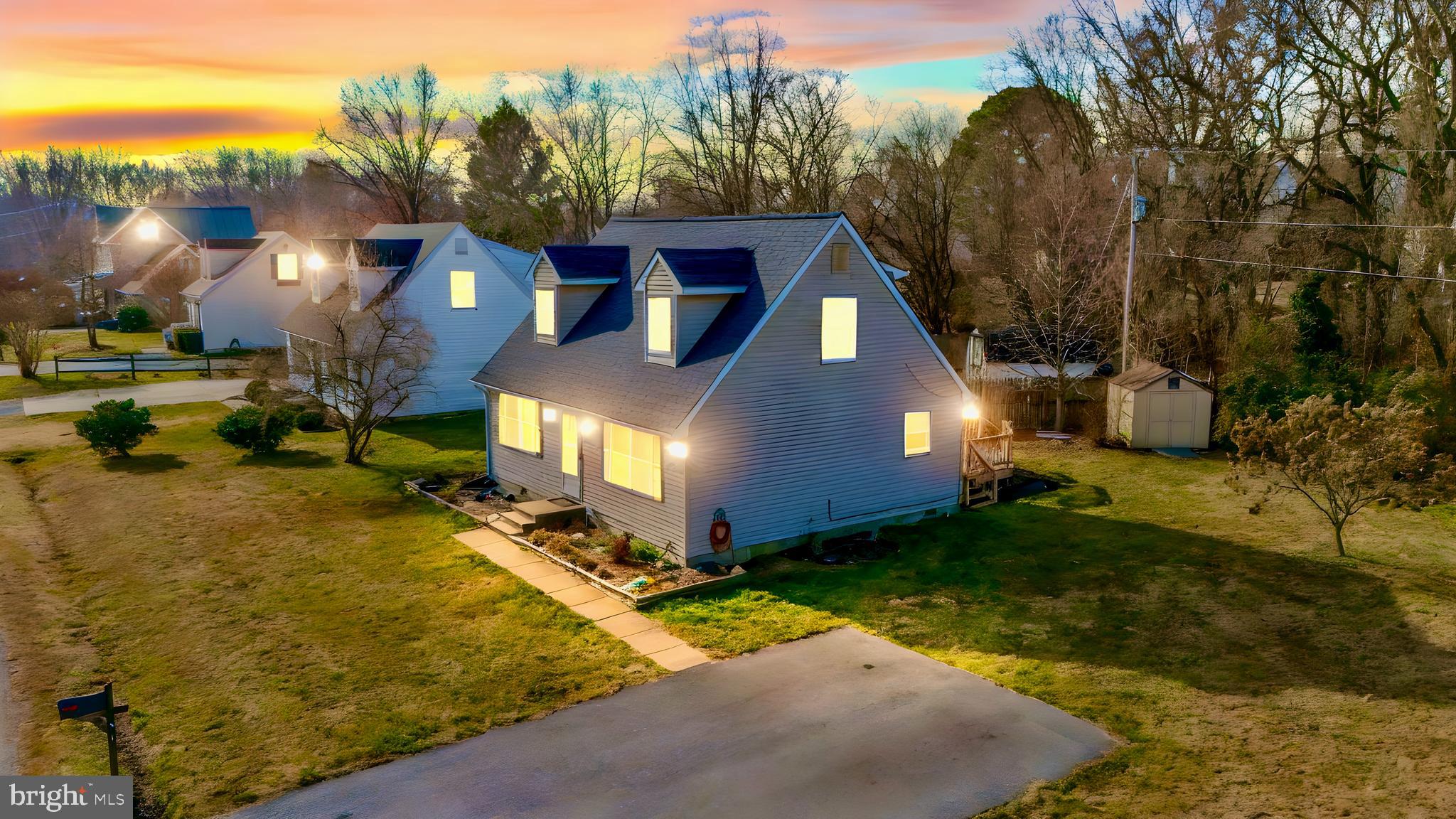 211 State Street Stevensville, MD 21666 - Photo 4 of 6 a view of a house with a yard