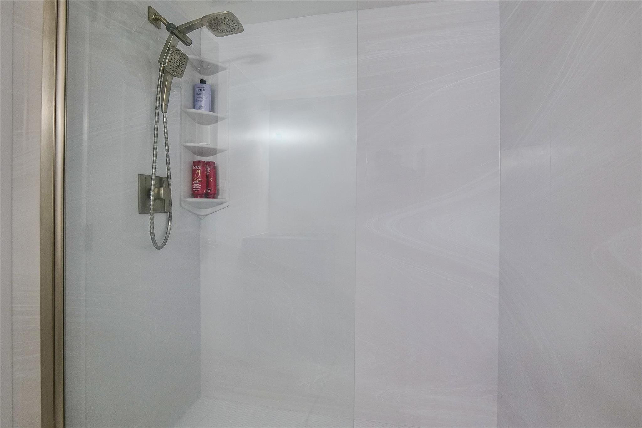 3930 Inverrary Boulevard, Unit 407D Lauderhill, FL 33319 - Photo 22 of 60 a bathroom with a shower
