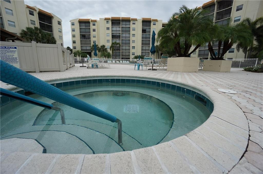 3930 Inverrary Boulevard, Unit 407D Lauderhill, FL 33319 - Photo 38 of 60 a view of a swimming pool with outdoor seating