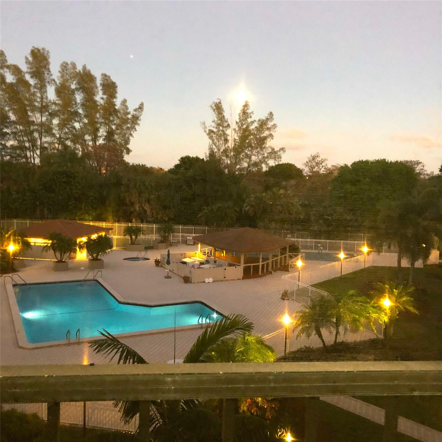 3930 Inverrary Boulevard, Unit 407D Lauderhill, FL 33319 - Photo 4 of 60 a view of a swimming pool with an ocean