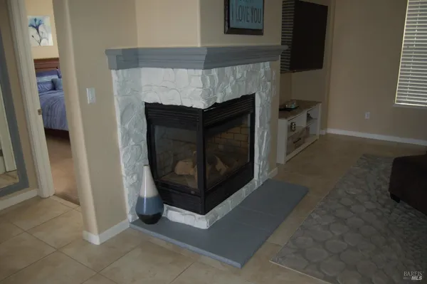 a living room with a fireplace