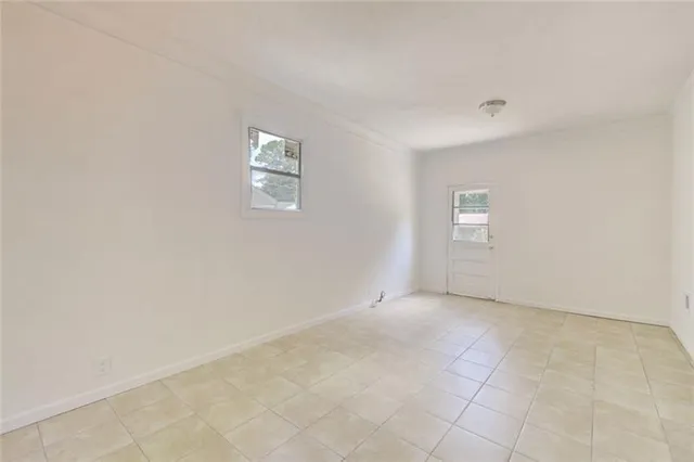 a view of a workspace with furniture