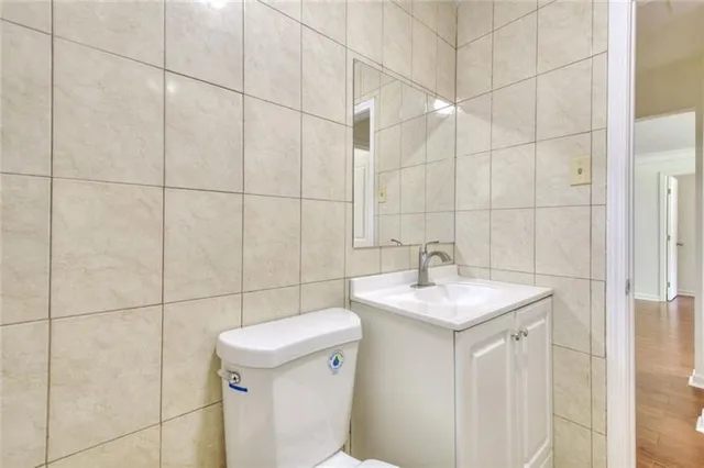 a view of a park with large trees