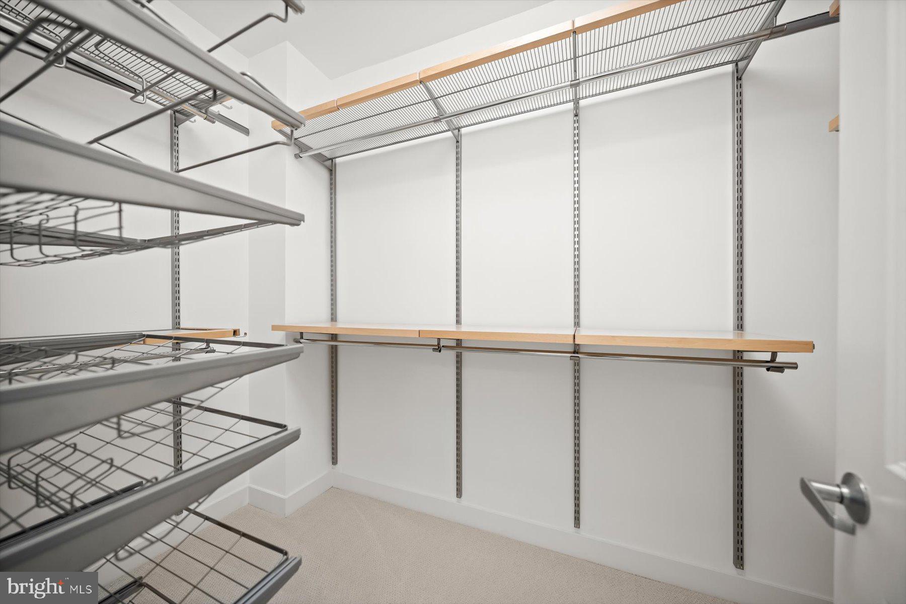 2227 12th Court North Arlington, VA 22201 - Photo 24 of 62 a view of a room with rack on the wall and a window