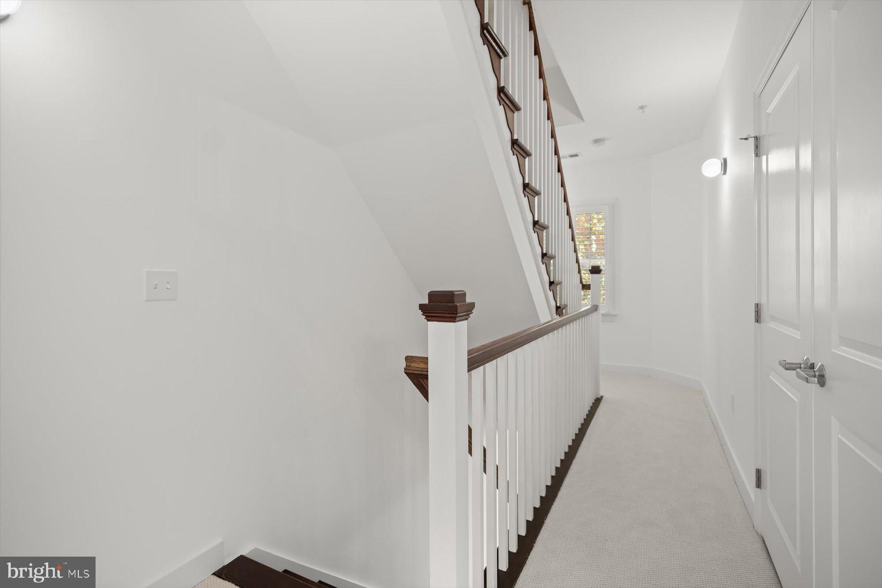 2227 12th Court North Arlington, VA 22201 - Photo 28 of 62 a view of a hallway with wooden floor and entryway