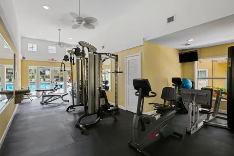 a view of a room with gym equipment
