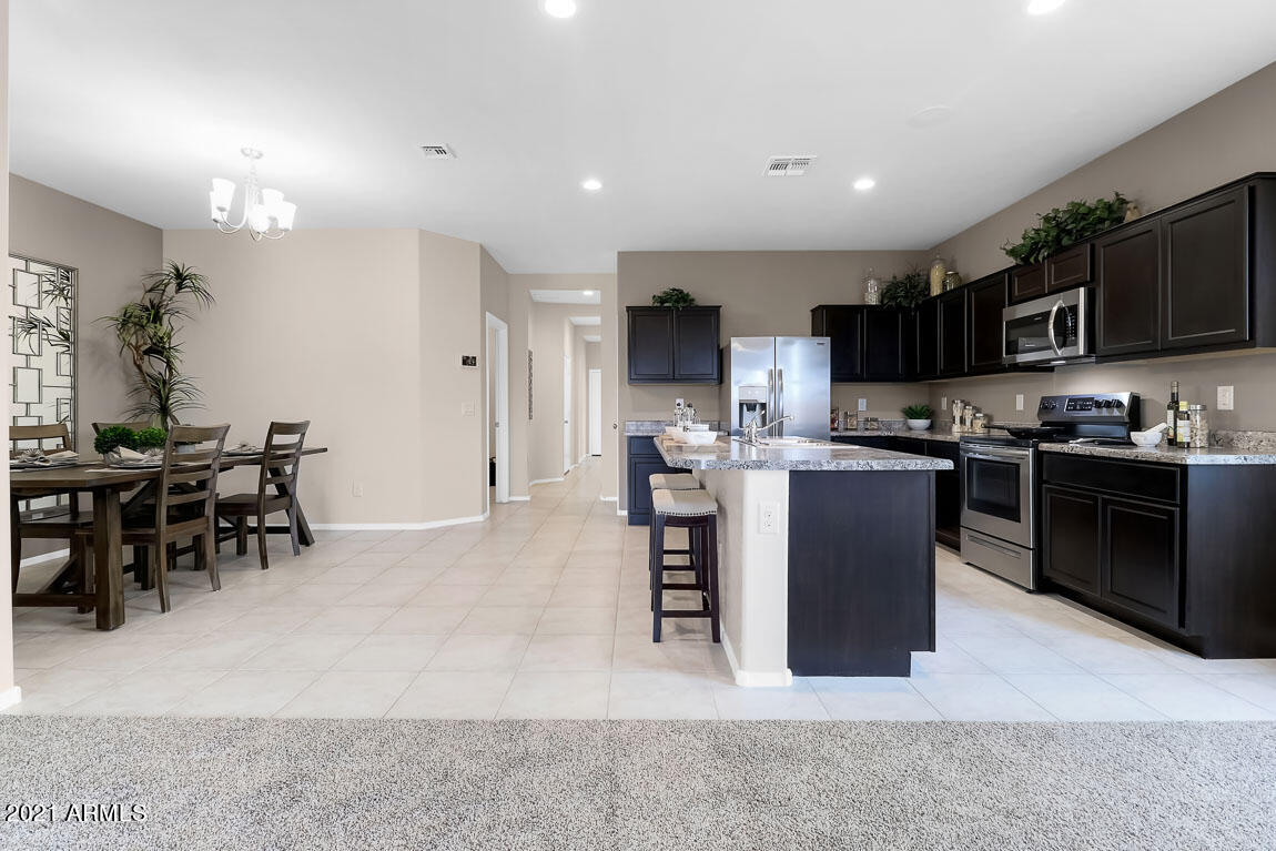 24632 Barley Road Florence, AZ 85132 - Photo 4 of 10 Dove kitchen and dining area