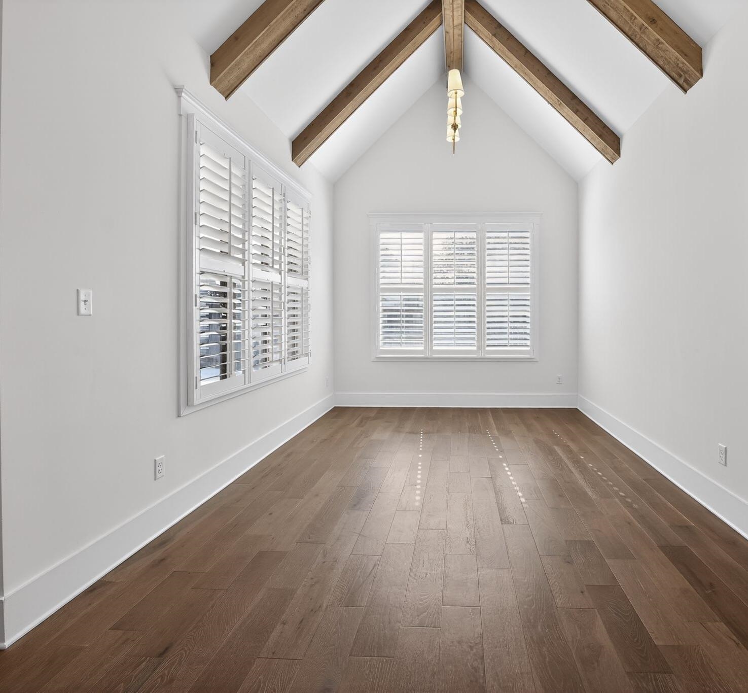 1421 Peyton Run Loop South Collierville, TN 38017 - Photo 12 of 29 Spare room with baseboards and dark wood finished floors
