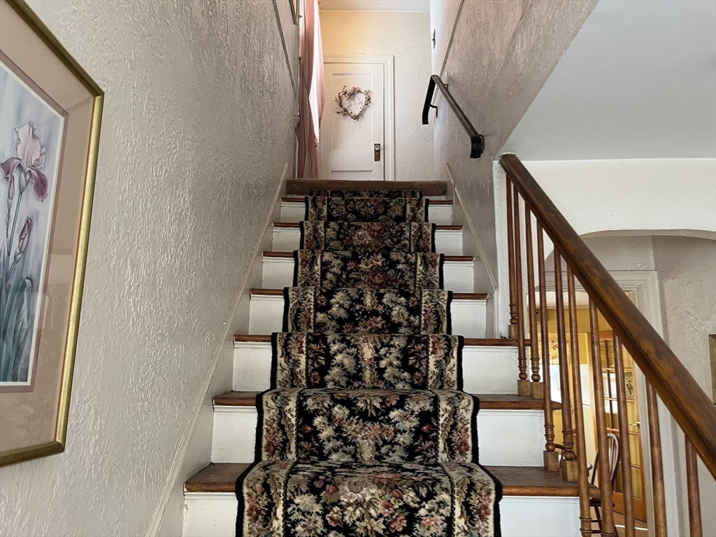 305 Harrington Way, Unit 1 Worcester, MA 01604 - Photo 12 of 21 a view of entryway with wooden floor