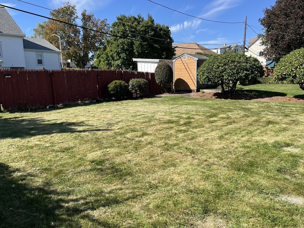 305 Harrington Way, Unit 1 Worcester, MA 01604 - Photo 19 of 21 a view of a backyard