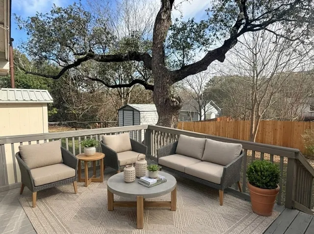 a house with trees in the background