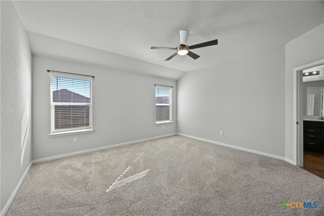 118 Rochester Lane Hutto, TX 78634 - Photo 15 of 33 a view of an empty room with a window
