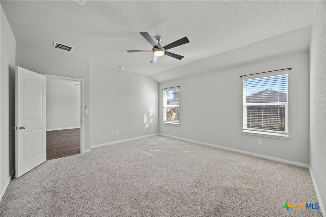 118 Rochester Lane Hutto, TX 78634 - Photo 16 of 33 a view of an empty room with a window