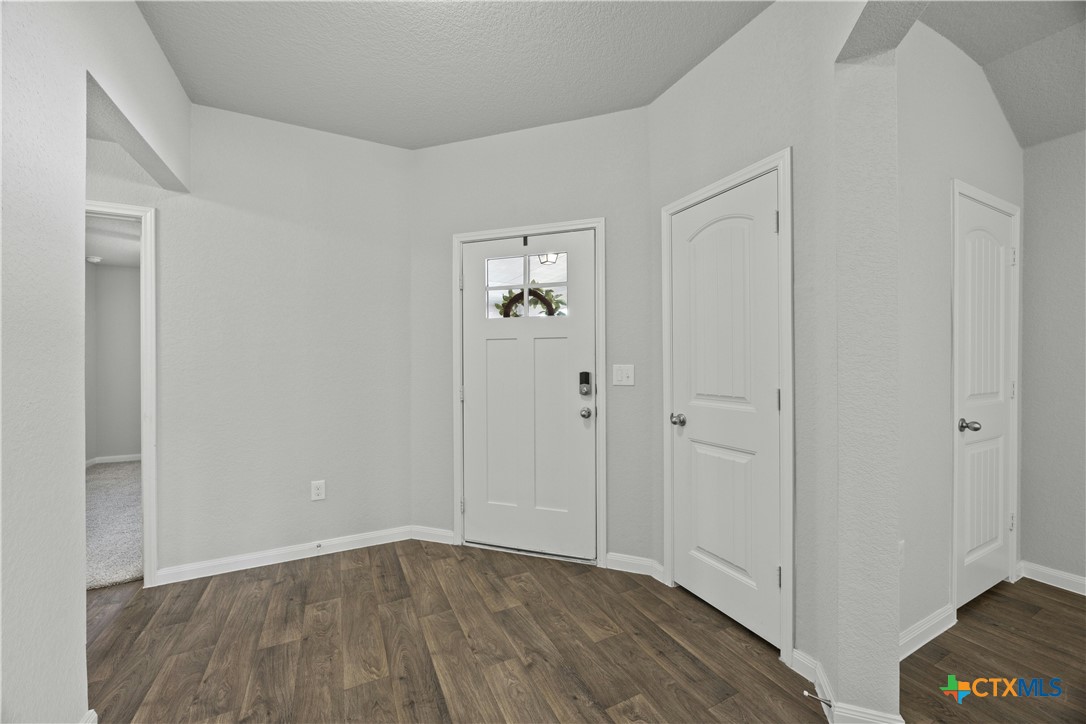 118 Rochester Lane Hutto, TX 78634 - Photo 21 of 33 a view of an empty room with closet and a window