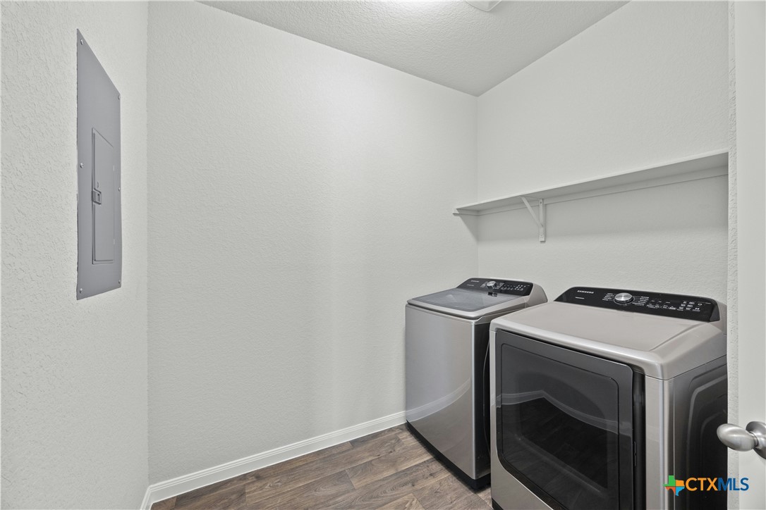 118 Rochester Lane Hutto, TX 78634 - Photo 31 of 33 a utility room with dryer and washer