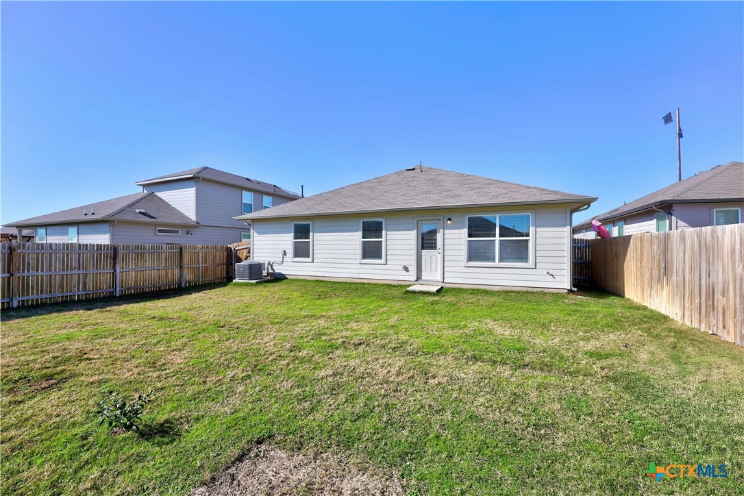 118 Rochester Lane Hutto, TX 78634 - Photo 33 of 33 a front view of a house with a garden