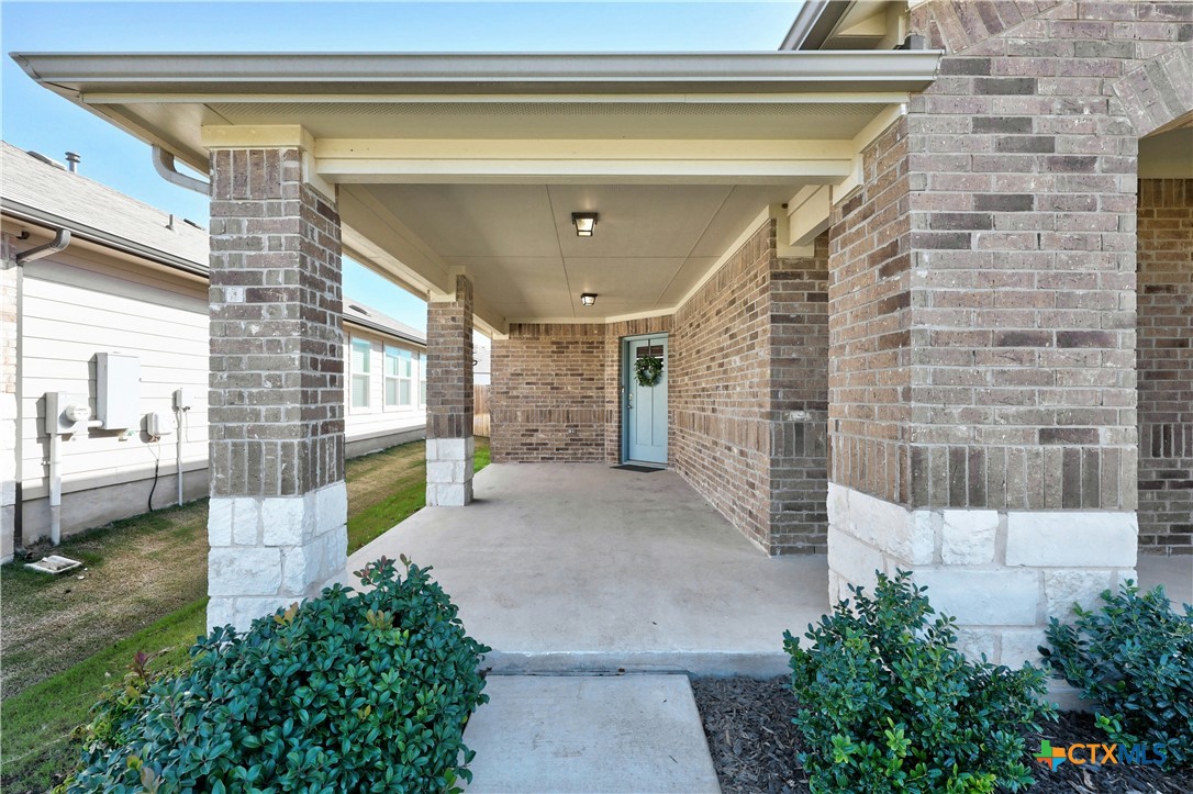 118 Rochester Lane Hutto, TX 78634 - Photo 4 of 33 a front view of a house with a yard