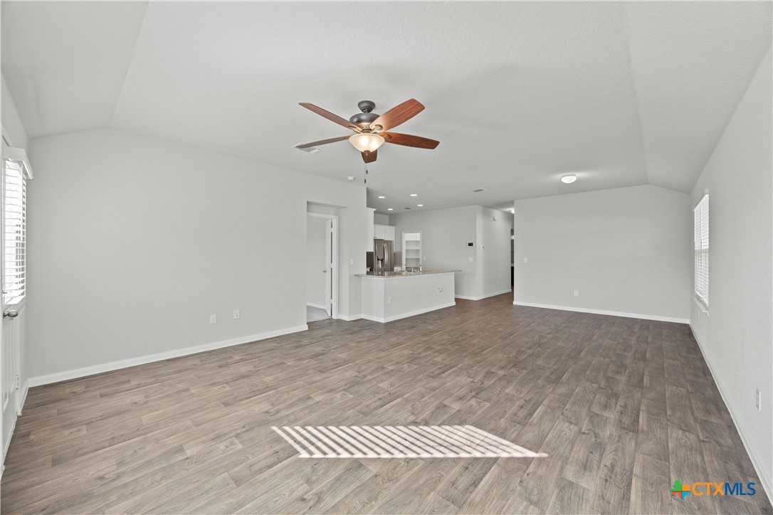 118 Rochester Lane Hutto, TX 78634 - Photo 8 of 33 a view of a kitchen with a sink and a chandelier
