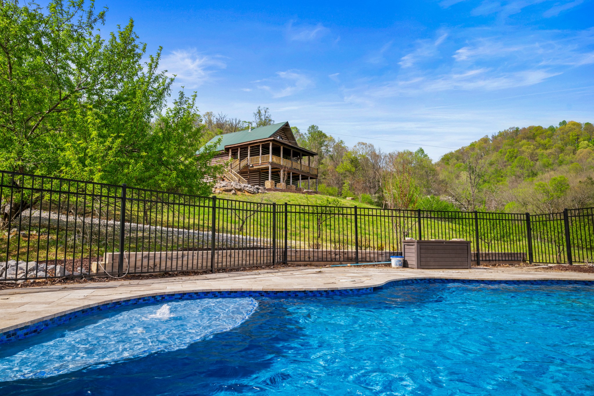 4818 Ensor Hollow Road Granville, TN 38564 - Photo 3 of 52 a view of a park with swings