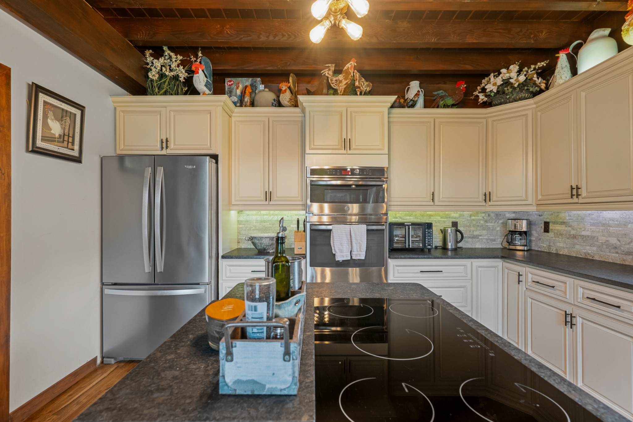4818 Ensor Hollow Road Granville, TN 38564 - Photo 31 of 52 a kitchen with stainless steel appliances granite countertop a sink a stove and a refrigerator