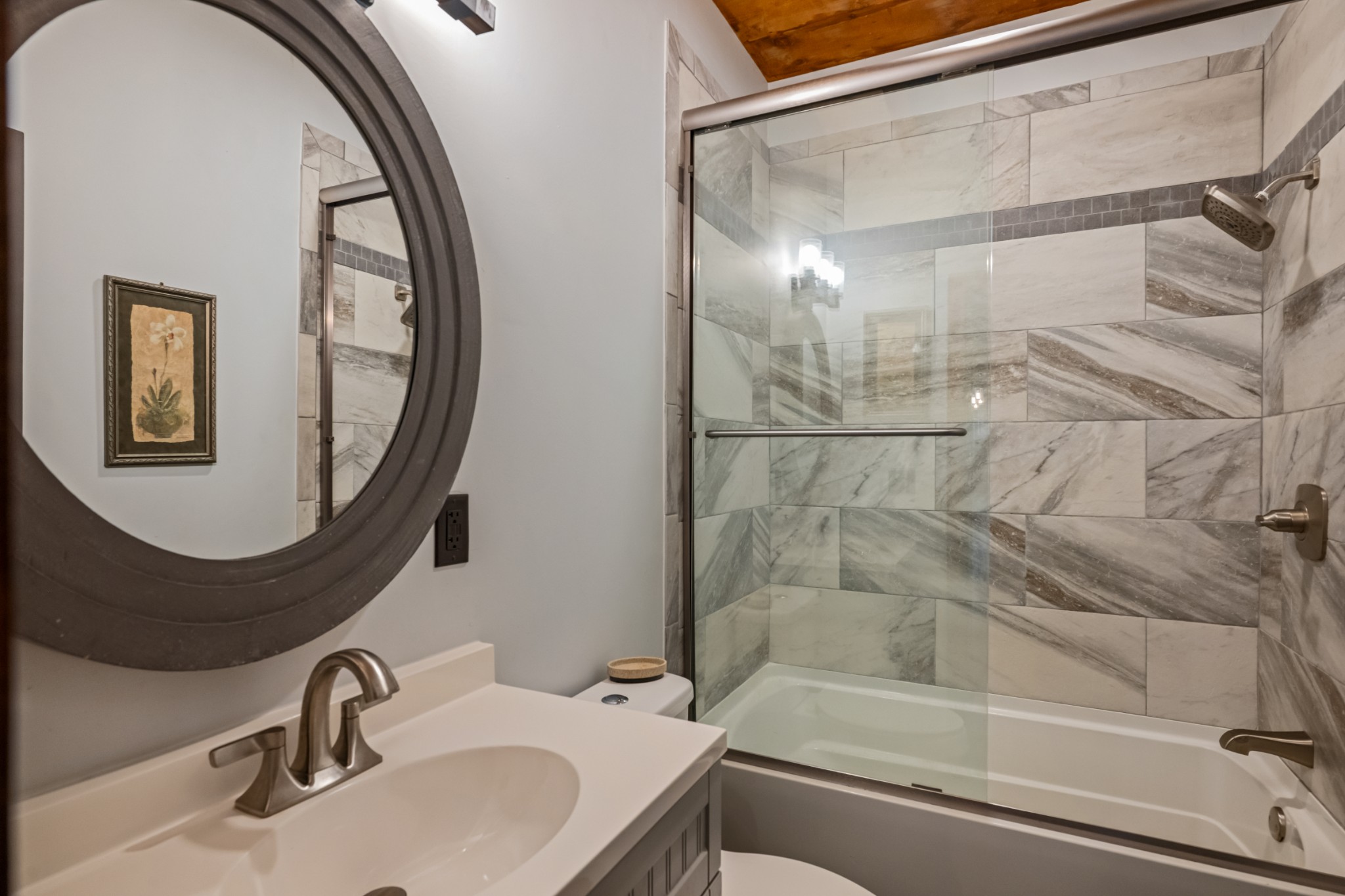 4818 Ensor Hollow Road Granville, TN 38564 - Photo 32 of 52 a bathroom with a sink and a mirror
