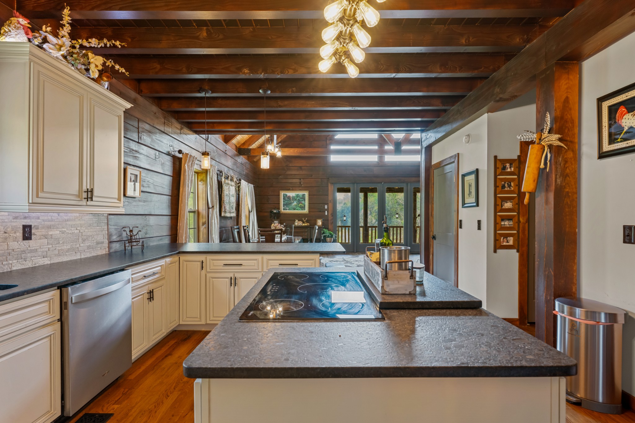 4818 Ensor Hollow Road Granville, TN 38564 - Photo 37 of 52 a kitchen with stainless steel appliances granite countertop a sink window and cabinets