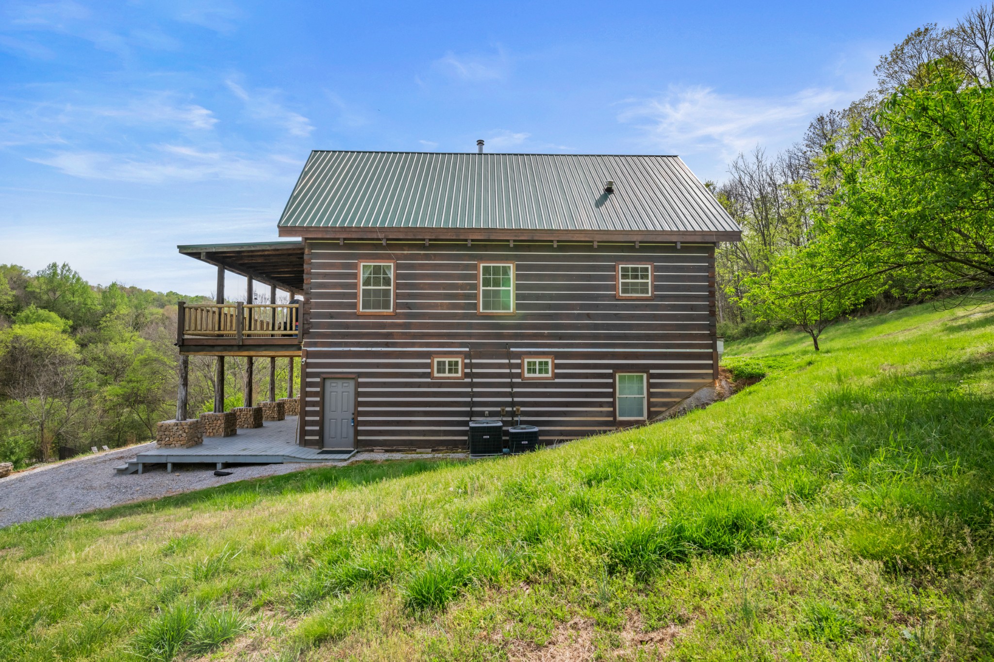 4818 Ensor Hollow Road Granville, TN 38564 - Photo 41 of 52 a view of a house with a yard