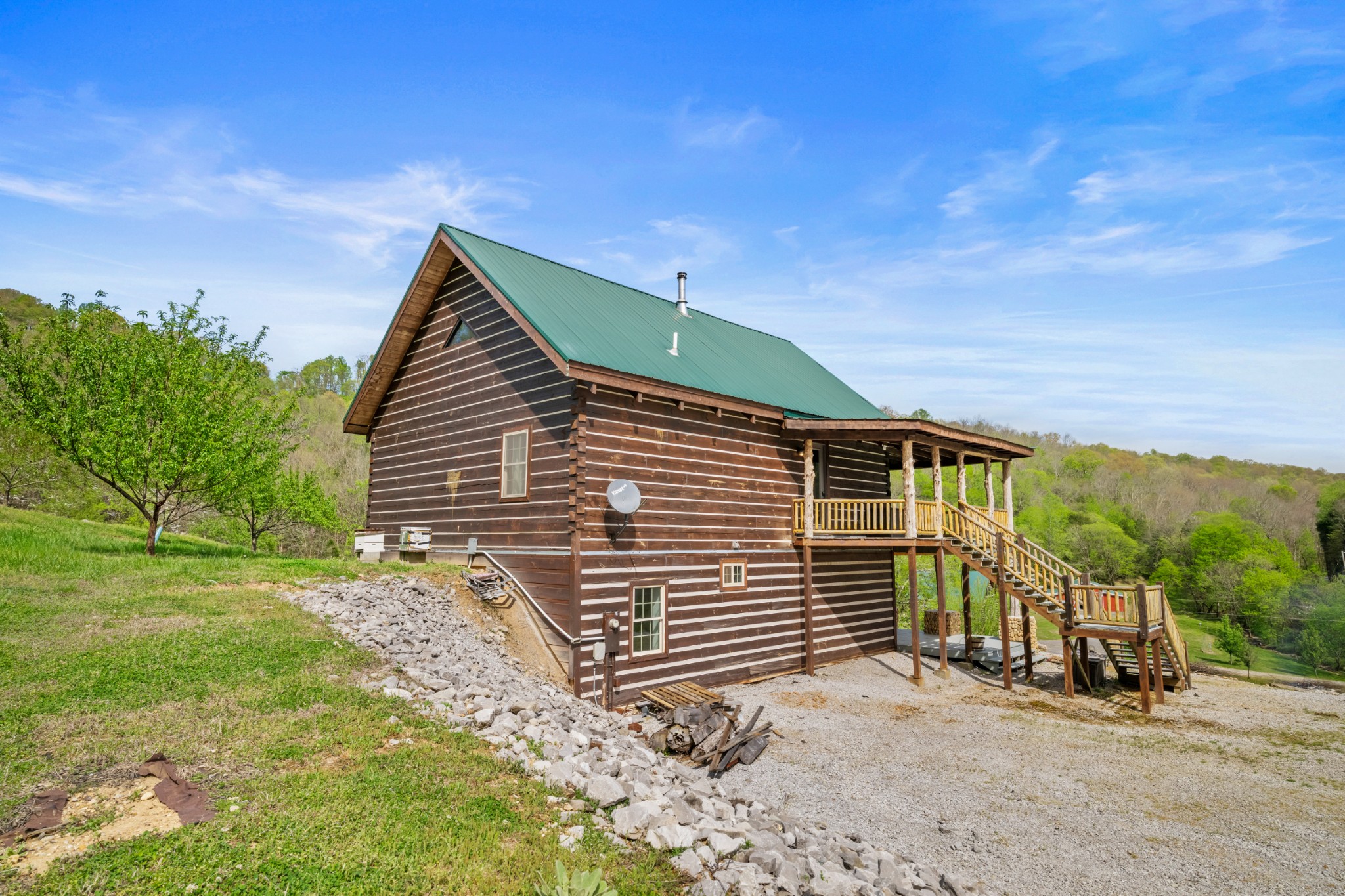 4818 Ensor Hollow Road Granville, TN 38564 - Photo 42 of 52 a view of a house with a yard