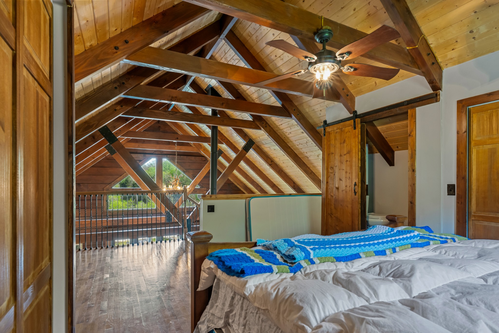 4818 Ensor Hollow Road Granville, TN 38564 - Photo 43 of 52 a bed sitting in a bedroom next to a window