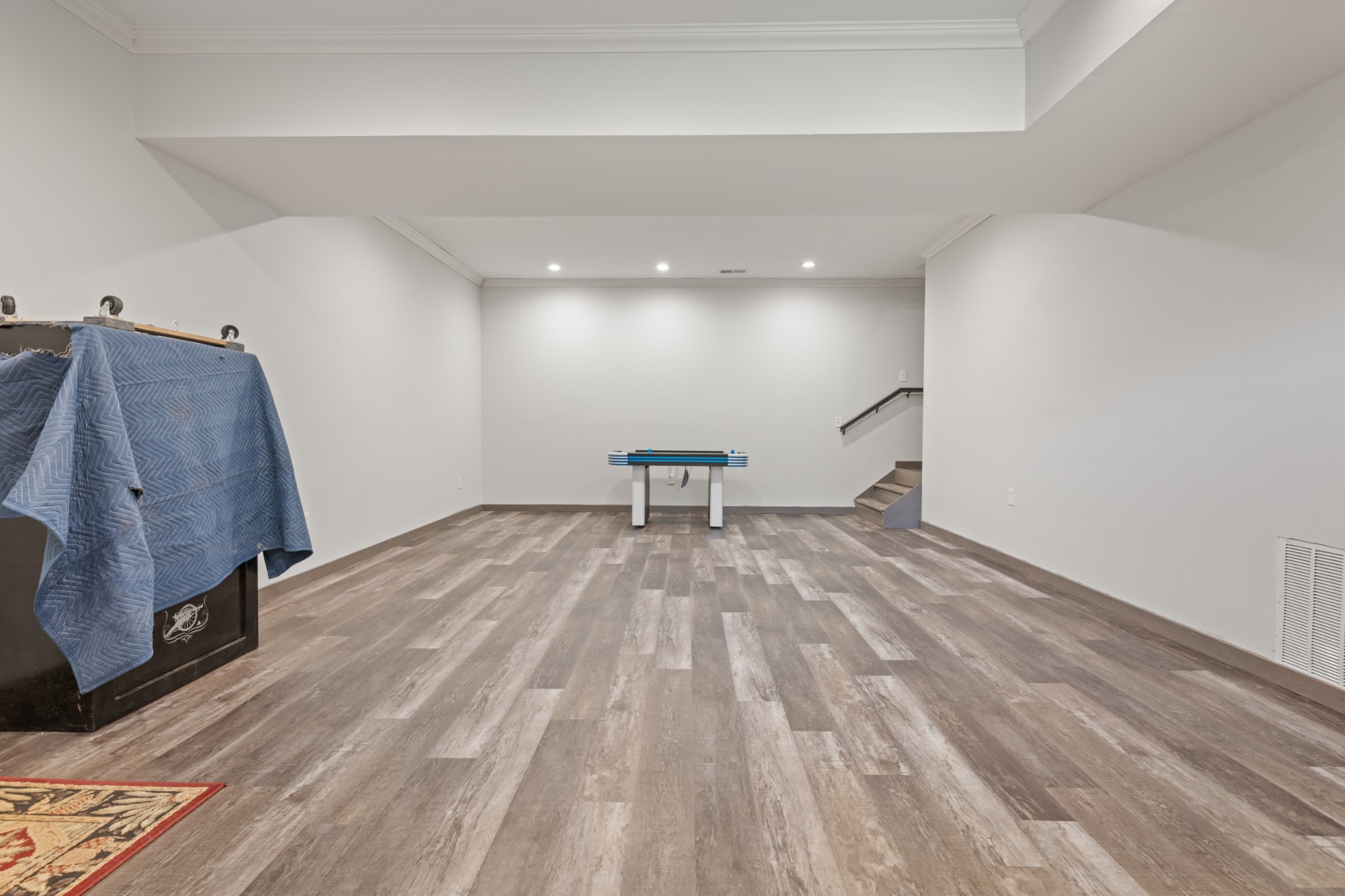 4818 Ensor Hollow Road Granville, TN 38564 - Photo 48 of 52 a view of a room with wooden floor and a rug