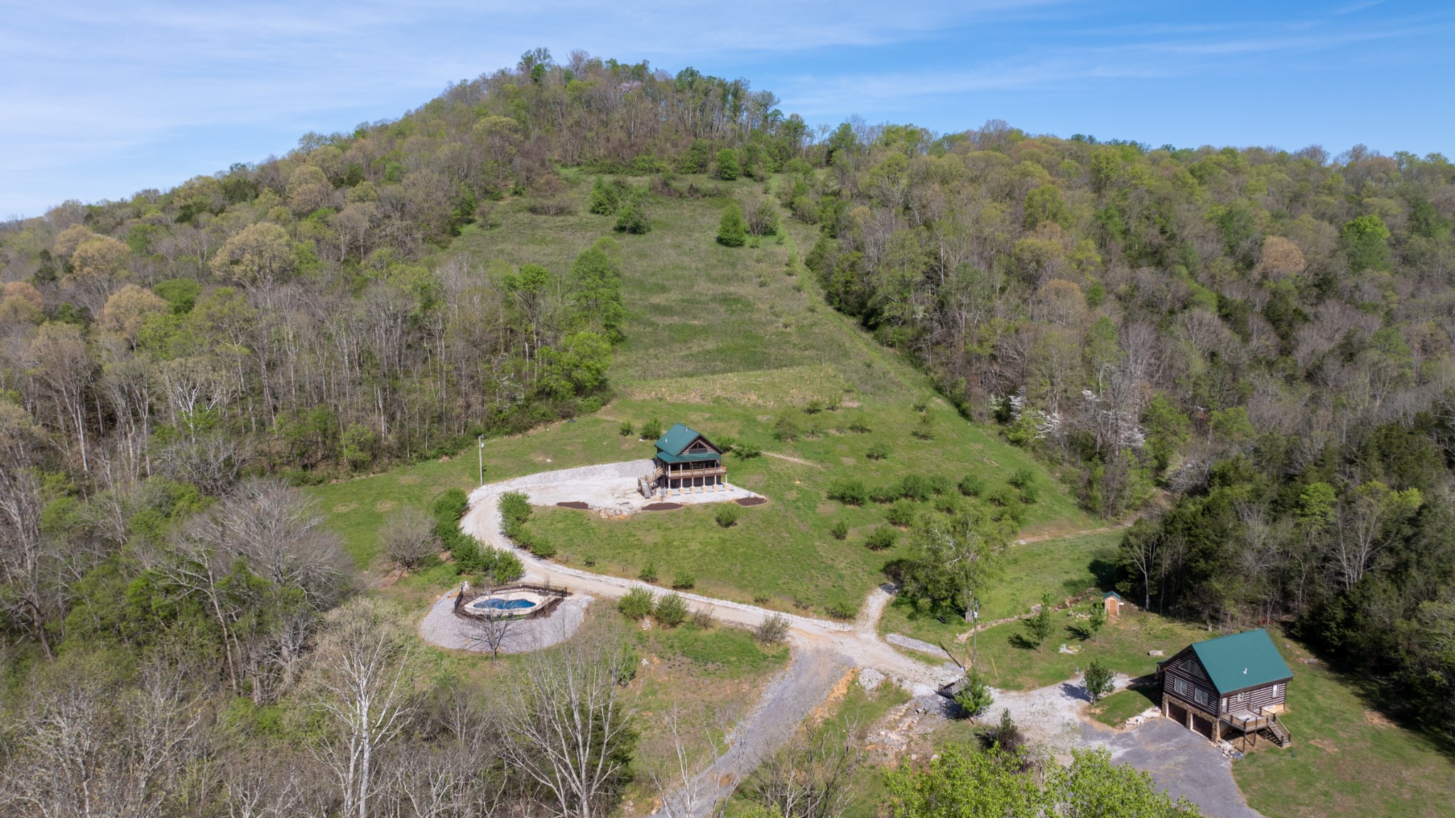 4818 Ensor Hollow Road Granville, TN 38564 - Photo 5 of 52 a view of a forest with a lake