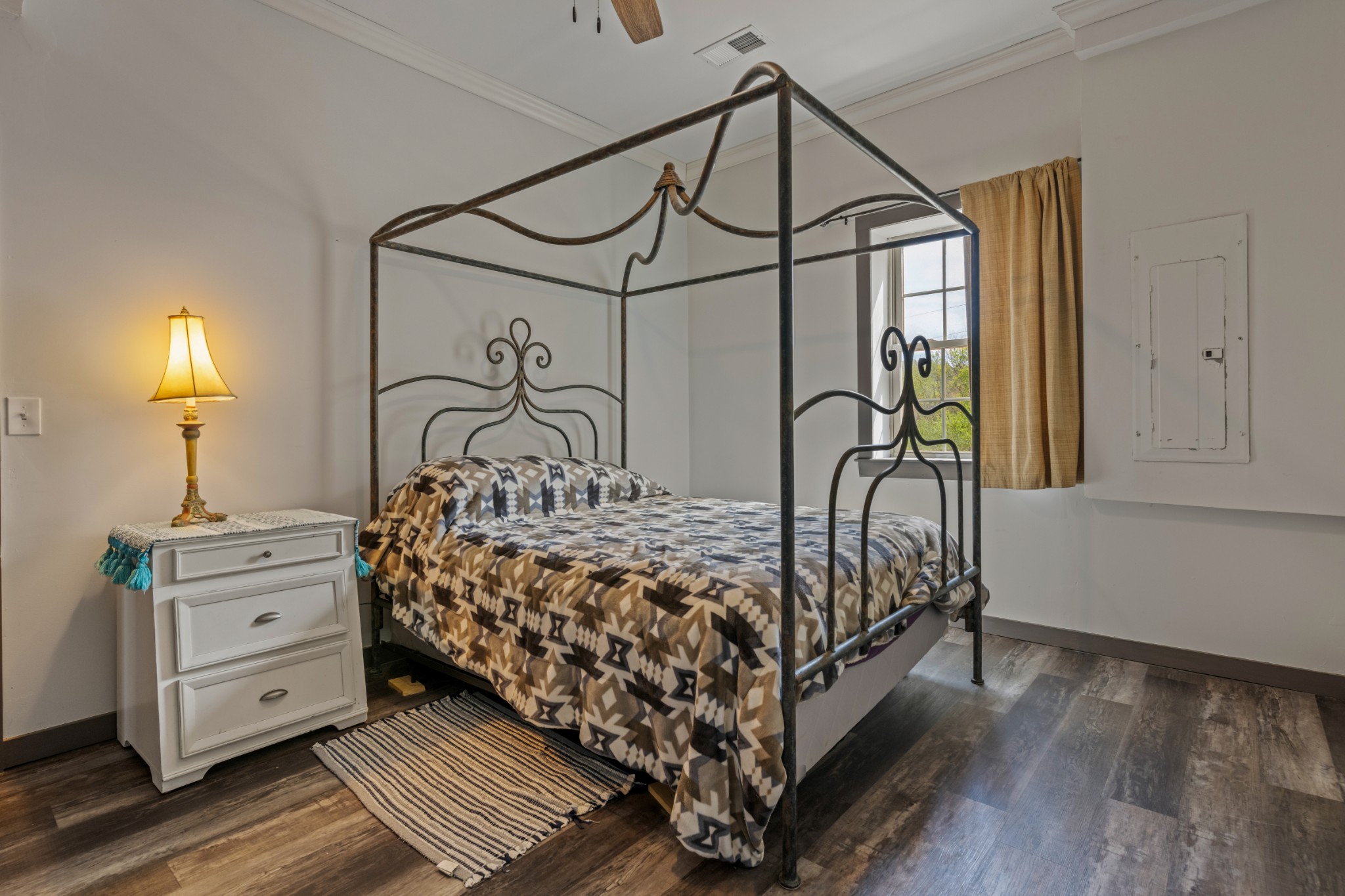 4818 Ensor Hollow Road Granville, TN 38564 - Photo 51 of 52 a bedroom with a bed next to a window with the dresser