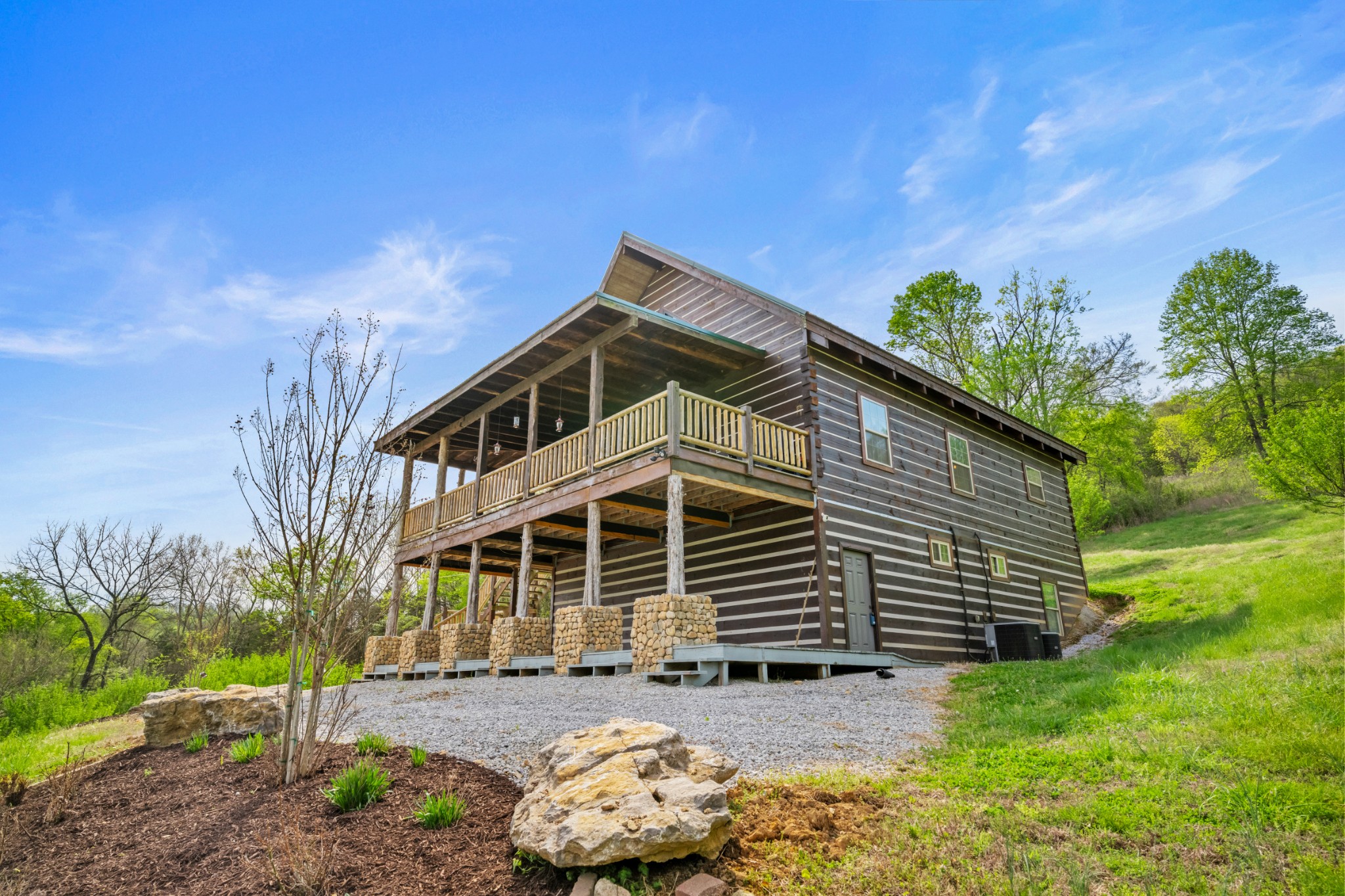 4818 Ensor Hollow Road Granville, TN 38564 - Photo 9 of 52 a front view of a house with a yard